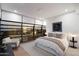 Bright main bedroom with city views, a plush bed, an accent chair, and large windows for ample natural light at 7180 E Kierland Blvd # 1116, Scottsdale, AZ 85254