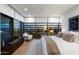 City views from this main bedroom with expansive windows, providing an abundance of natural light and stunning scenery at 7180 E Kierland Blvd # 1116, Scottsdale, AZ 85254
