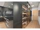 This unique home has a glass-enclosed, temperature-controlled wine cellar, ideal for showcasing and storing an extensive collection at 7180 E Kierland Blvd # 1116, Scottsdale, AZ 85254