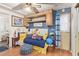 Charming bedroom featuring nautical decor, wooden floors, and soft lighting at 8700 E University Dr # 1205, Mesa, AZ 85207