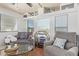 Bright living room with comfortable seating, decorative accents, and ample natural light at 8700 E University Dr # 1205, Mesa, AZ 85207