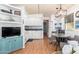Open-concept with dining area and built-in TV hutch, creating a cozy atmosphere at 8700 E University Dr # 1205, Mesa, AZ 85207