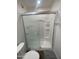 Well lit bathroom showing sliding glass shower door with white subway tile at 903 W Jacinto Cir, Mesa, AZ 85210