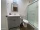 Modern bathroom featuring grey vanity and sliding glass door shower at 903 W Jacinto Cir, Mesa, AZ 85210