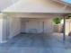 A covered carport with ample space for parking and features a bench for comfortable waiting or relaxation at 903 W Jacinto Cir, Mesa, AZ 85210