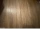 Close-up of wood-look flooring, highlighting its texture and pattern at 903 W Jacinto Cir, Mesa, AZ 85210