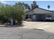 Inviting single-story home with a well-maintained front yard and covered carport at 903 W Jacinto Cir, Mesa, AZ 85210