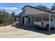 Charming single-story home with a carport and a stone picnic table at 903 W Jacinto Cir, Mesa, AZ 85210