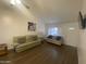 Bright living room featuring comfortable seating, complemented by modern decor and natural light at 903 W Jacinto Cir, Mesa, AZ 85210