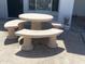 Inviting patio with a unique stone picnic table for outdoor relaxation at 903 W Jacinto Cir, Mesa, AZ 85210