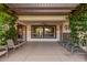 Covered patio with comfortable seating, perfect for outdoor relaxation and entertaining at 10529 E Posada Ave, Mesa, AZ 85212