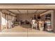 Spacious garage with an open door, ideal for parking and storage solutions at 10529 E Posada Ave, Mesa, AZ 85212