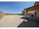 Large backyard with potential for a patio, garden, or outdoor entertainment area at 12408 W Orange Dr, Litchfield Park, AZ 85340