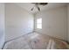 Bedroom with ceiling fan, a double-door closet and window with natural light at 12408 W Orange Dr, Litchfield Park, AZ 85340