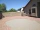 Large backyard space with low maintenance rock landscaping and a block wall at 12425 W Montebello Ave, Litchfield Park, AZ 85340