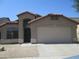 Charming single-story home with desert landscaping and a two-car garage at 12425 W Montebello Ave, Litchfield Park, AZ 85340