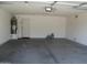 Spacious two-car garage with a water heater at 12425 W Montebello Ave, Litchfield Park, AZ 85340
