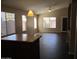 Open concept living space with updated floors and a ceiling fan at 12425 W Montebello Ave, Litchfield Park, AZ 85340