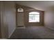 Bright living room with large window providing ample natural light at 12425 W Montebello Ave, Litchfield Park, AZ 85340