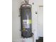 Water heater, inside the garage, and other home equipment at 12425 W Montebello Ave, Litchfield Park, AZ 85340