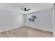 Spacious bedroom with a large window offering natural light and a pleasant outdoor view at 13224 N 31St Pl, Phoenix, AZ 85032