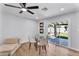 Bright dining area with sliding glass doors that lead to the outdoor patio and garden space at 13224 N 31St Pl, Phoenix, AZ 85032