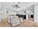 Modern open concept kitchen and living area with a large island and breakfast bar seating at 13224 N 31St Pl, Phoenix, AZ 85032