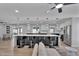 Bright modern kitchen with a large island, bar seating, and stainless steel appliances at 13224 N 31St Pl, Phoenix, AZ 85032