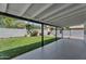 Covered patio showcases an inviting view of the landscaped backyard, perfect for outdoor enjoyment at 13224 N 31St Pl, Phoenix, AZ 85032