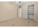 Cozy bedroom with closet, ceiling fan, and carpet at 14333 W Alvarado Dr, Goodyear, AZ 85395