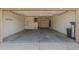 Spacious two-car garage with ample room for parking and storage, ready for your projects at 14333 W Alvarado Dr, Goodyear, AZ 85395