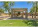 Community park pavilion providing shade and seating near a playground, perfect for Gathering outings at 14333 W Alvarado Dr, Goodyear, AZ 85395