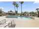 Spend a relaxing day at the community pool with lounge chairs, palm trees, and a ramada at 1449 W Sherri Dr, Gilbert, AZ 85233