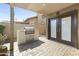 Outdoor grilling area featuring a built-in grill and ample patio space for entertaining at 1449 W Sherri Dr, Gilbert, AZ 85233