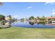 Waterfront community with beautiful houses and private boat docks, surrounded by lush landscaping at 1449 W Sherri Dr, Gilbert, AZ 85233