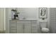 Stylish bathroom featuring modern vanity, clean white cabinets and modern fixtures at 15883 W Winslow Ave, Goodyear, AZ 85338