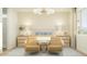 Bedroom boasts a stylish bed, matching nightstands, and a modern light fixture at 15883 W Winslow Ave, Goodyear, AZ 85338