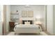 Charming bedroom featuring a stylish bed, soft lighting, and a cozy atmosphere at 15883 W Winslow Ave, Goodyear, AZ 85338