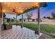 Covered patio overlooking the backyard and pool area at 16437 N 61St Ave, Glendale, AZ 85306