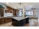 Gourmet kitchen featuring a large island, custom cabinetry, and modern appliances, perfect for entertaining at 16437 N 61St Ave, Glendale, AZ 85306