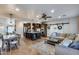 Open-concept living space showcases the kitchen island, dining area, and cozy living room at 16437 N 61St Ave, Glendale, AZ 85306