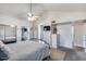 Main bedroom features a mirrored closet and en-suite bathroom at 16437 N 61St Ave, Glendale, AZ 85306