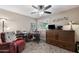 Functional office space with a desk, comfortable chair, and storage solutions at 1753 Leisure World --, Mesa, AZ 85206