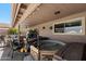 Covered patio featuring a relaxing hot tub and outdoor seating area at 1753 Leisure World --, Mesa, AZ 85206