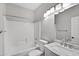 Bright bathroom featuring a shower/tub combo with a white vanity and marble countertop at 1821 S Navajo Way, Chandler, AZ 85286