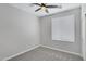 Neutral bedroom with carpet, ceiling fan and window with blinds at 1821 S Navajo Way, Chandler, AZ 85286