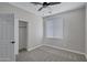 Light-filled bedroom features a closet, neutral paint, and plush carpet at 1821 S Navajo Way, Chandler, AZ 85286