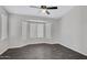 Bedroom features wood floors, neutral paint, and a bay window providing natural light at 1821 S Navajo Way, Chandler, AZ 85286