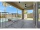 A covered patio overlooks a backyard with a sparkling pool at 1821 S Navajo Way, Chandler, AZ 85286