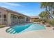 Backyard pool features desert landscaping and a fenced patio at 1821 S Navajo Way, Chandler, AZ 85286